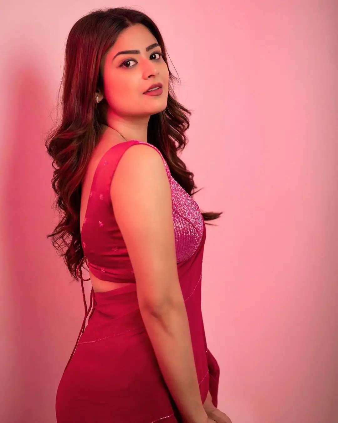 Priyanka Sharma Stills In Pink Saree Sleeveless Blouse